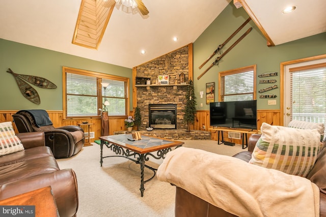 60 Barbaras Way, Mc Henry, MD 21541 - carpeted living area featuring wainscoting, a stone fireplace, a ceiling fan, lofted ceiling, and recessed lighting