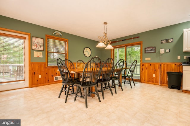 60 Barbaras Way, Mc Henry, MD 21541 - dining area with wainscoting, wood walls, and light floors
