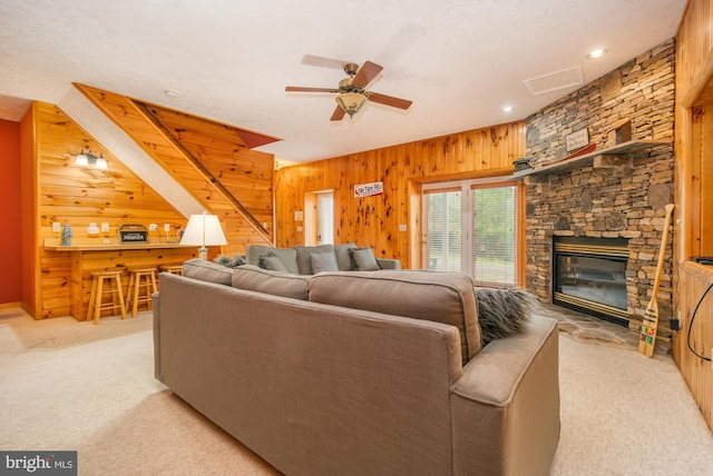 60 Barbaras Way, Mc Henry, MD 21541 - living room with wooden walls, light carpet, a ceiling fan, a stone fireplace, and recessed lighting