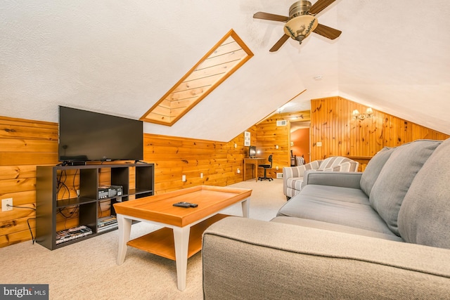 60 Barbaras Way, Mc Henry, MD 21541 - living area featuring wooden walls, carpet flooring, vaulted ceiling, and a ceiling fan
