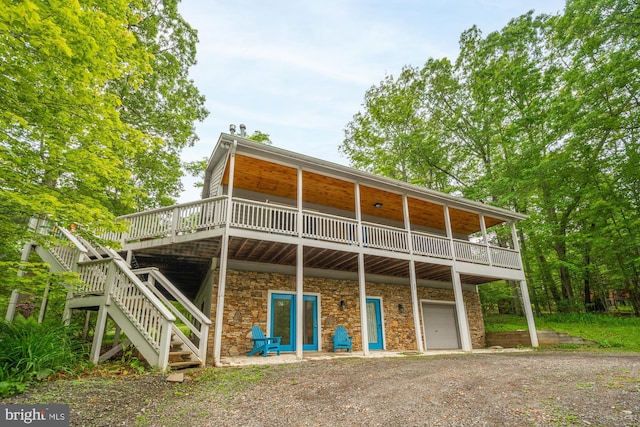 60 Barbaras Way, Mc Henry, MD 21541 - back of property with a garage, a deck, driveway, stone siding, and stairway