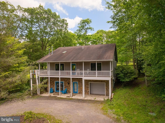 60 Barbaras Way, Mc Henry, MD 21541 - view of front of property with driveway, a garage, stone siding, and stairs