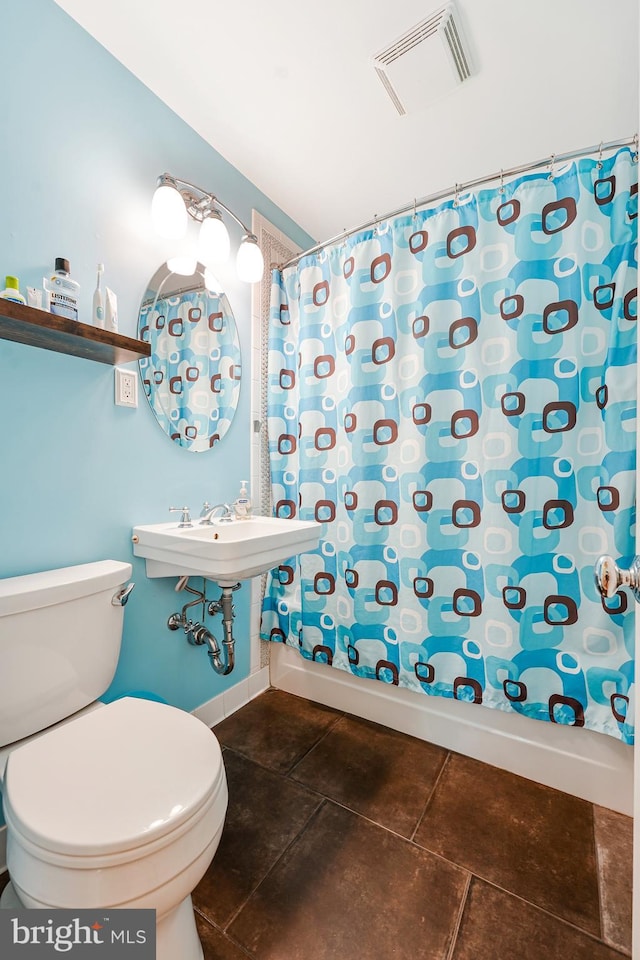 8615 Acorn Cir, Vienna, VA 22180 - full bath featuring toilet and shower / bath combo with shower curtain