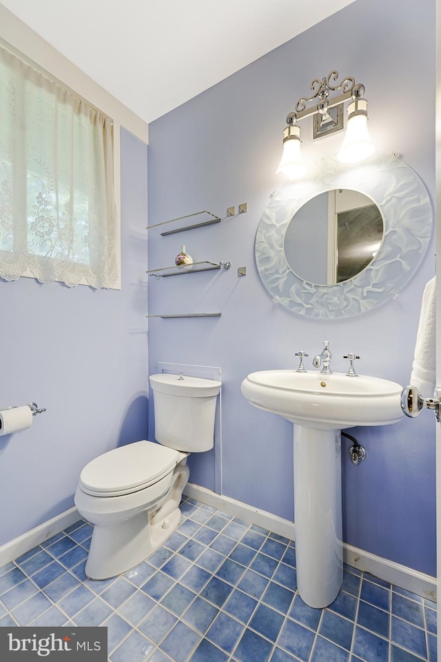 8615 Acorn Cir, Vienna, VA 22180 - bathroom with tile patterned flooring and toilet