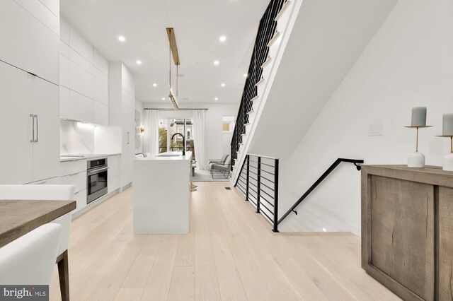 146 S St NW Unit B, Washington, DC 20001 - living room featuring light wood finished floors and recessed lighting