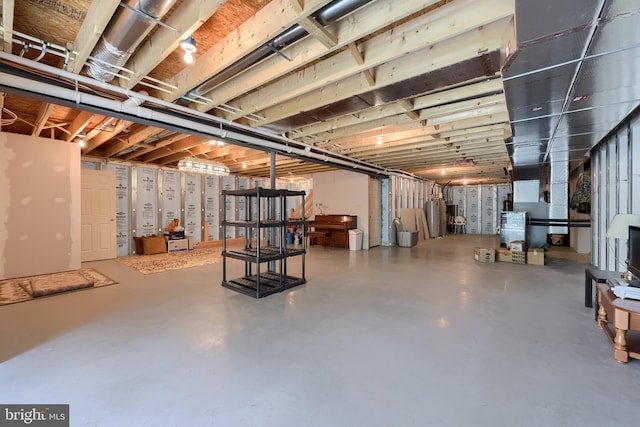 36 Elm Ct, Lancaster, PA 17603 - unfinished basement featuring water heater