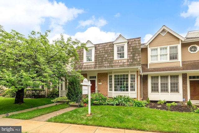 1937 Hickory Hill Ln, Silver Spring, MD 20906 - view of front facade featuring brick siding and a front lawn