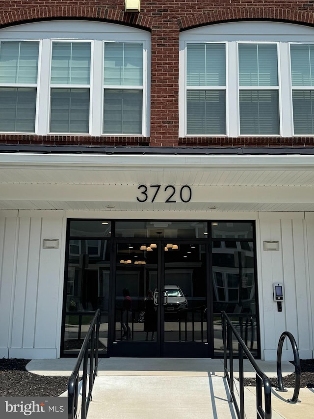 3720 Havertill Ln Unit 303, Woodbridge, VA 22193 - view of exterior entry featuring brick siding
