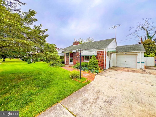4701 Forest St, Bristol, PA 19007 - view of front of property featuring an attached garage, driveway, brick siding, and a chimney
