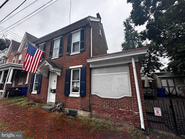 110 Chestnut St, Pottstown, PA 19464 - view of property featuring brick siding