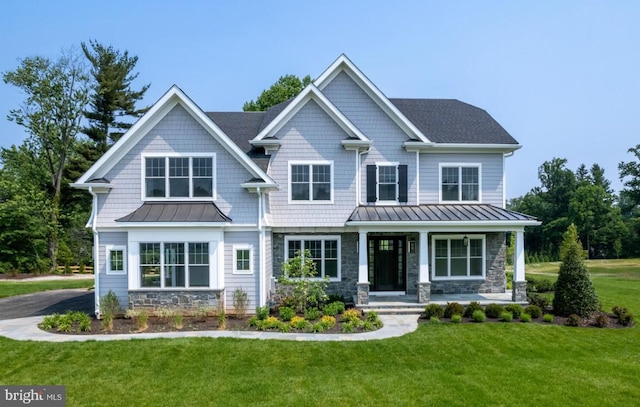 Lot1 Nathan Hale, Berwyn, PA 19312 - craftsman-style house with a standing seam roof, stone siding, covered porch, a front yard, and a metal roof