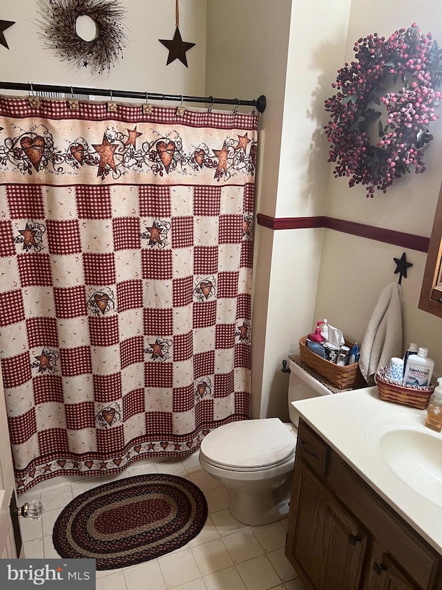 1034 Hamilton Blvd, Hagerstown, MD 21742 - bathroom featuring vanity, a shower with shower curtain, and tile patterned floors