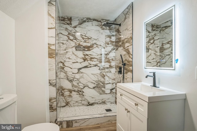 121 Almond Ct, Milford, PA 18337 - bathroom featuring a marble finish shower and vanity