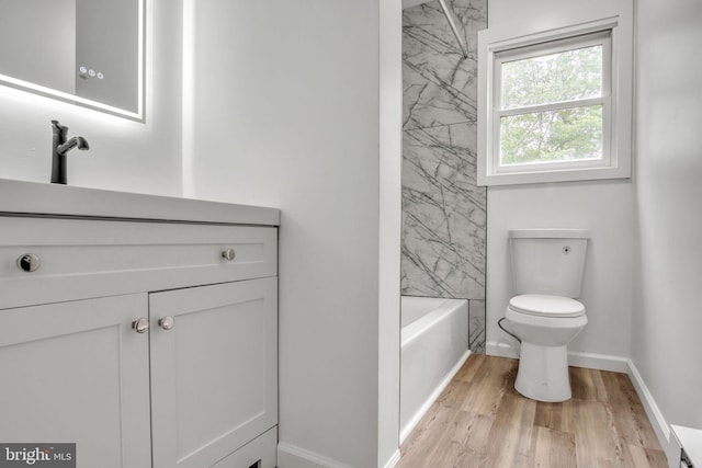 121 Almond Ct, Milford, PA 18337 - bathroom featuring vanity, wood finished floors, and  shower combination