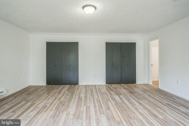 121 Almond Ct, Milford, PA 18337 - unfurnished bedroom with wood finished floors and baseboards