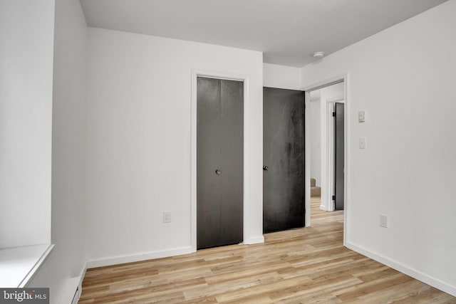 121 Almond Ct, Milford, PA 18337 - unfurnished bedroom with light wood finished floors and a closet