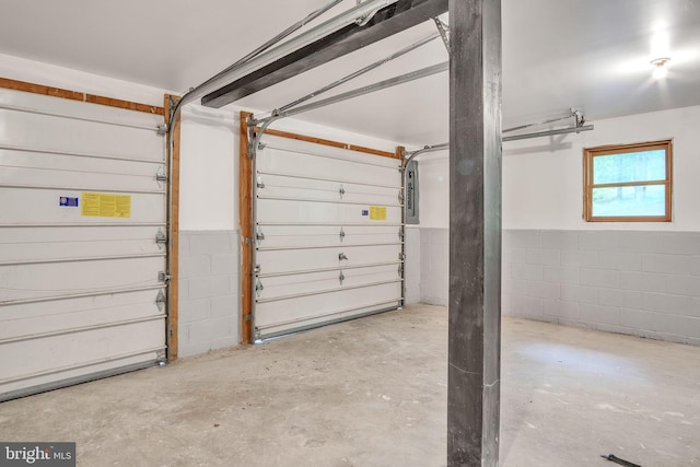 121 Almond Ct, Milford, PA 18337 - garage featuring electric panel and concrete block wall