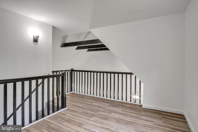 121 Almond Ct, Milford, PA 18337 - stairway featuring wood finished floors and baseboards