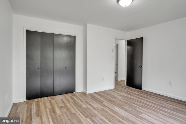 121 Almond Ct, Milford, PA 18337 - unfurnished bedroom with wood finished floors and a closet