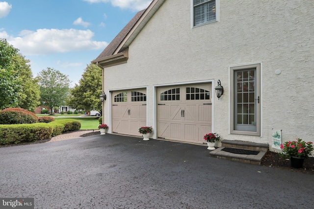 3245 Hedwig Ln, Collegeville, PA 19426 - garage featuring asphalt driveway