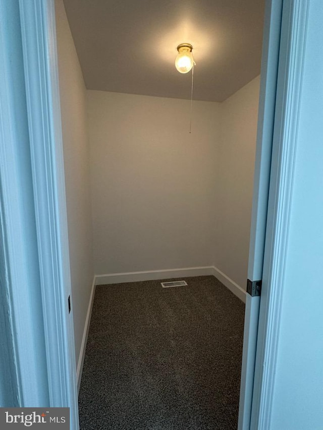 8357 Gannon Cir, Easton, MD 21601 - unfurnished room with dark colored carpet and baseboards