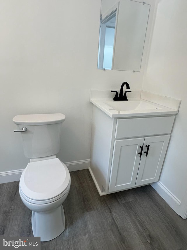 8357 Gannon Cir, Easton, MD 21601 - half bathroom with wood finished floors and vanity