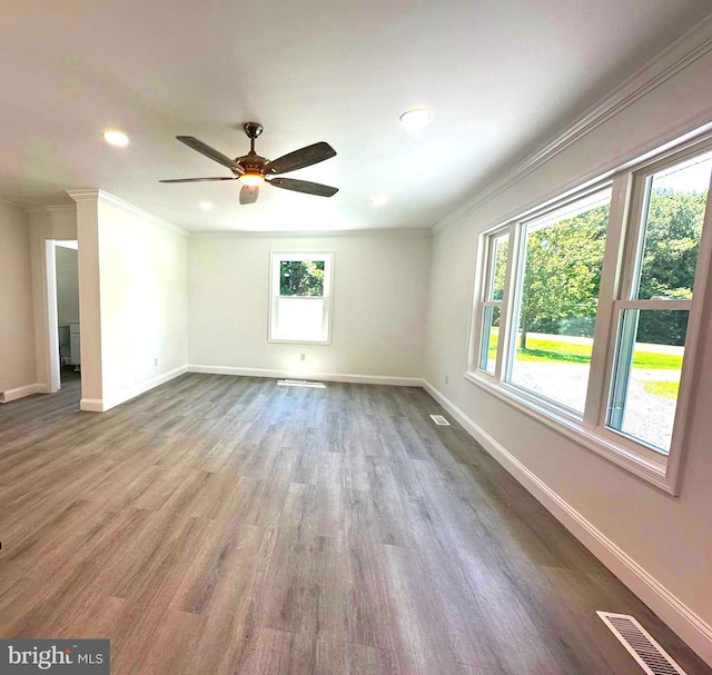 8357 Gannon Cir, Easton, MD 21601 - spare room with healthy amount of natural light, ornamental molding, recessed lighting, wood finished floors, and ceiling fan