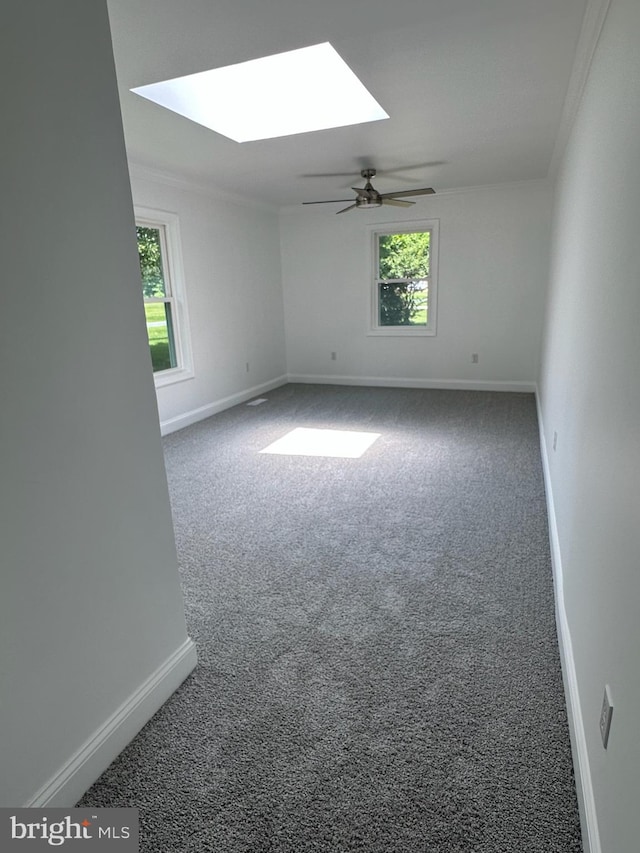 8357 Gannon Cir, Easton, MD 21601 - carpeted spare room featuring a skylight and ceiling fan