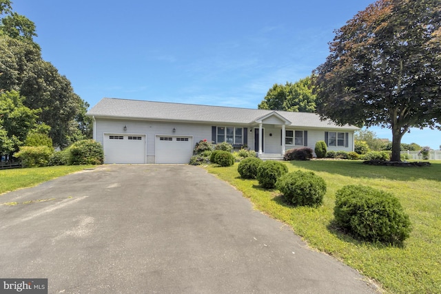 5 Michael Ct, Rehoboth Beach, DE 19971 - ranch-style house featuring a garage, driveway, and a front yard