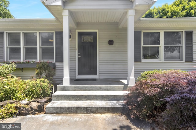 5 Michael Ct, Rehoboth Beach, DE 19971 - doorway to property featuring covered porch