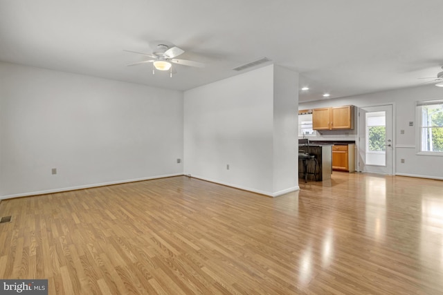 5 Michael Ct, Rehoboth Beach, DE 19971 - unfurnished living room with ceiling fan, light wood-style floors, and recessed lighting