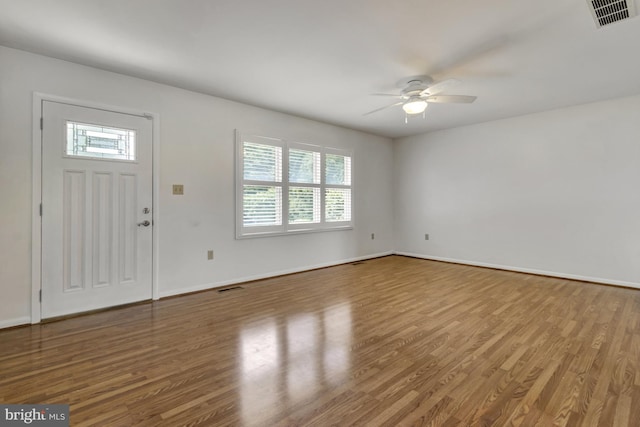 5 Michael Ct, Rehoboth Beach, DE 19971 - foyer entrance featuring a ceiling fan, healthy amount of natural light, and wood finished floors