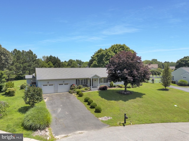 5 Michael Ct, Rehoboth Beach, DE 19971 - single story home featuring an attached garage, asphalt driveway, and a front lawn