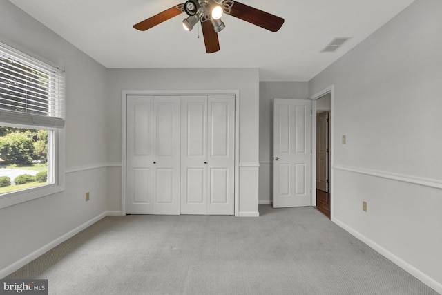 5 Michael Ct, Rehoboth Beach, DE 19971 - unfurnished bedroom featuring light colored carpet, a closet, and ceiling fan