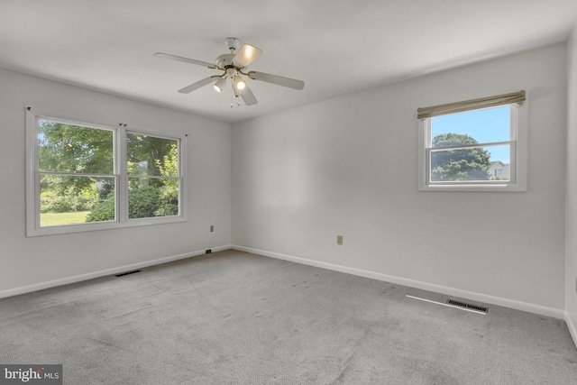 5 Michael Ct, Rehoboth Beach, DE 19971 - spare room with healthy amount of natural light, carpet flooring, and a ceiling fan