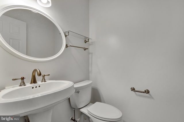 5 Michael Ct, Rehoboth Beach, DE 19971 - half bathroom featuring a sink and toilet