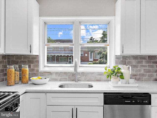 901 Vanderwood Rd, Baltimore, MD 21228 - kitchen with dishwasher, white cabinets, gas range oven, and light countertops