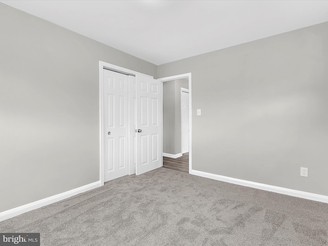 901 Vanderwood Rd, Baltimore, MD 21228 - unfurnished bedroom with carpet flooring and a closet