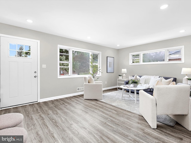 901 Vanderwood Rd, Baltimore, MD 21228 - living area featuring wood finished floors and recessed lighting