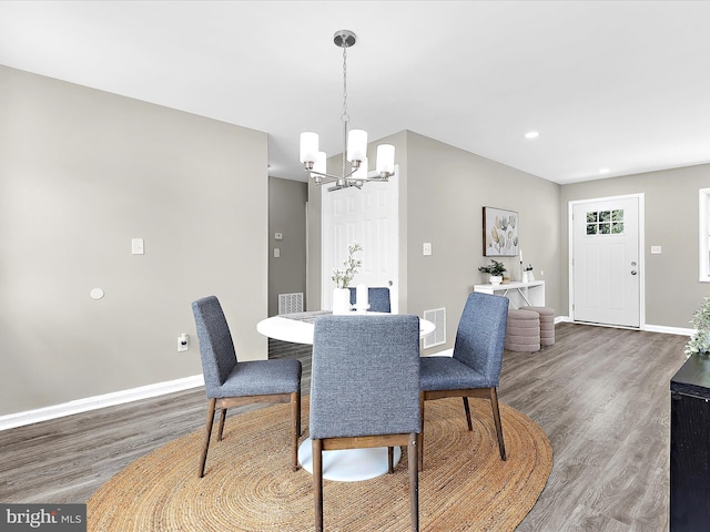 901 Vanderwood Rd, Baltimore, MD 21228 - dining area with a chandelier, wood finished floors, and recessed lighting