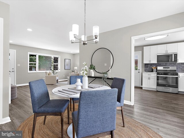 901 Vanderwood Rd, Baltimore, MD 21228 - dining room with a chandelier, recessed lighting, and dark wood-style flooring