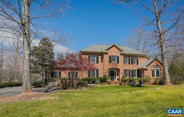 3190 Prestwick Pl, Keswick, VA 22947 - view of front facade featuring brick siding and a front lawn