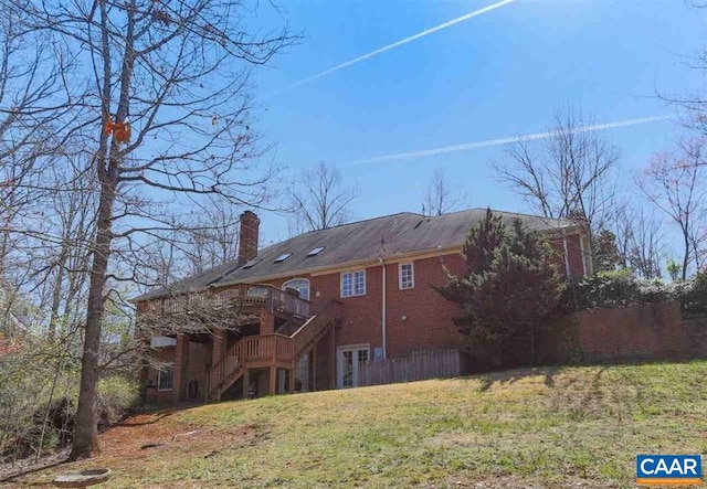 3190 Prestwick Pl, Keswick, VA 22947 - rear view of house featuring stairs, a wooden deck, a chimney, and brick siding