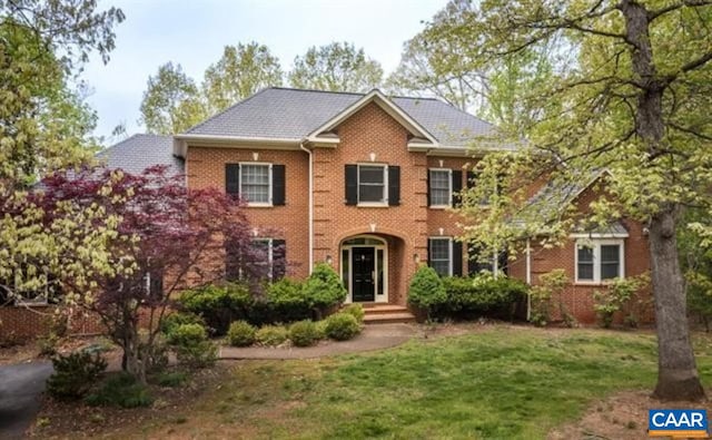 3190 Prestwick Pl, Keswick, VA 22947 - colonial home featuring brick siding and a front yard