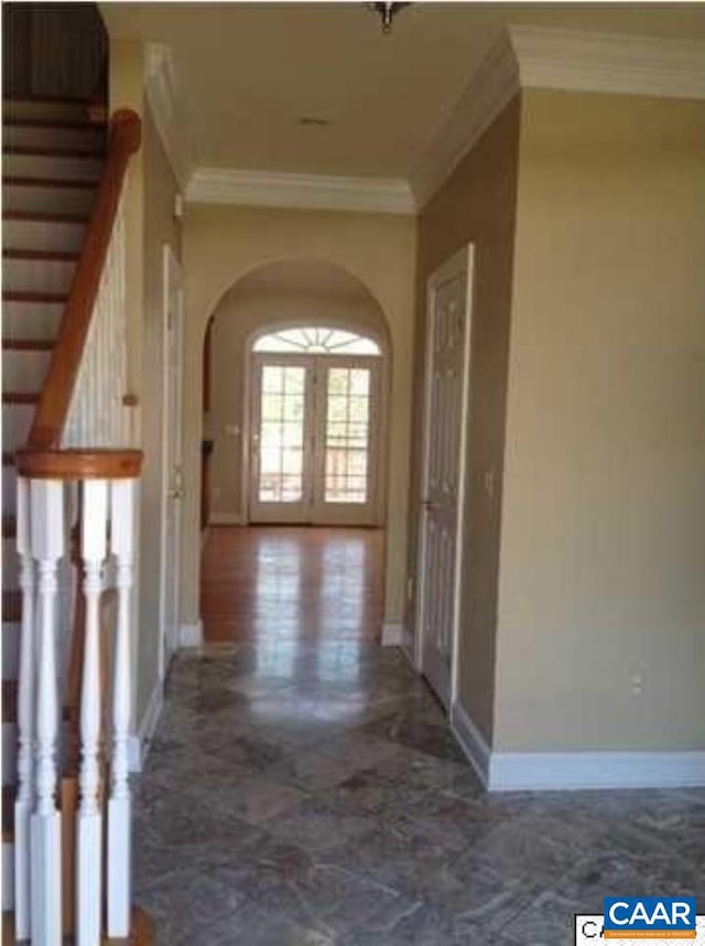 3190 Prestwick Pl, Keswick, VA 22947 - corridor with crown molding, arched walkways, and stairs