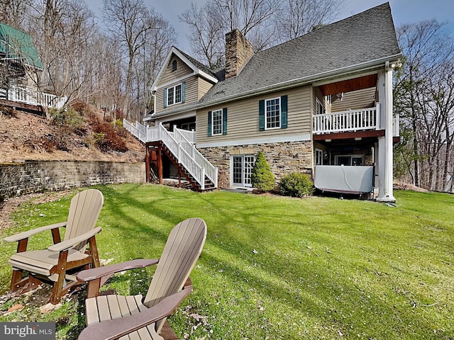 3067 Shingle Camp Rd, Mc Henry, MD 21541 - back of house with a chimney, a lawn, stairs, stone siding, and a shingled roof