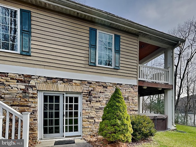 3067 Shingle Camp Rd, Mc Henry, MD 21541 - view of home's exterior with a hot tub, stone siding, and a balcony