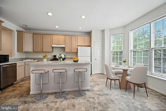 6949 Banchory Ct, Alexandria, VA 22315 - kitchen featuring stainless steel appliances, under cabinet range hood, light brown cabinets, recessed lighting, and a center island