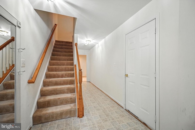 6949 Banchory Ct, Alexandria, VA 22315 - stairs with tile patterned floors and baseboards