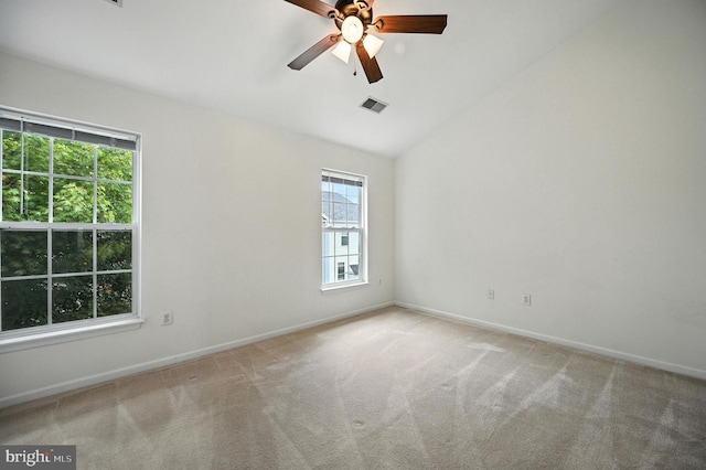 6949 Banchory Ct, Alexandria, VA 22315 - empty room featuring plenty of natural light, carpet floors, vaulted ceiling, and a ceiling fan